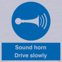 sound-horn-drive-slowly-warehousing-and-delivery-sign~